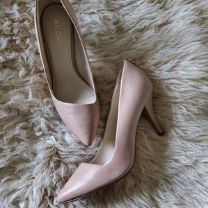 Beige leather pumps